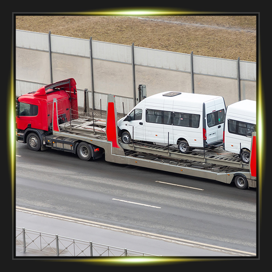 New minibuses to be transported on a trailer truck, delivery to dealers